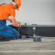 Worker Installs Lightning Protection Equipment on a Rooftop in Daylight Worker Installs Lightning Protection Equipment on a Rooftop in Daylight - PhotoDune Item for Sale