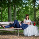 Newlywed Couple Sharing Quiet Forest Bench Newlywed Couple Sharing Quiet Forest Bench - PhotoDune Item for Sale