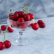 Cherry on the table in a vase close-up. Cherry on the table in a vase close-up. - PhotoDune Item for Sale
