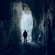 Scary photo of a dark silhouette inside a cave Scary photo of a dark silhouette inside a cave - PhotoDune Item for Sale