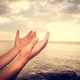 A man praying hand for blessings When the sun goes down Hope for a happy life A man praying hand for blessings When the sun goes down Hope for a happy life - PhotoDune Item for Sale