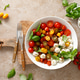 Salad with fresh cherry tomatoes, mozzarella and basil leaves, top view Salad with fresh cherry tomatoes, mozzarella and basil leaves, top view - PhotoDune Item for Sale