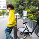 Man afro mexican looks direct at the camera at the bicycle parking station in Mexico City Man afro mexican looks direct at the camera at the bicycle parking station in Mexico City - PhotoDune Item for Sale
