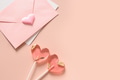 Valentine's day card with envelope and pink lollipops as heart. Valentine's day card with envelope and pink lollipops as heart. - PhotoDune Item for Sale
