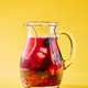 Fruit berry homemade lemonade in a glass jug on a yellow background with copy space. Healthy drink Fruit berry homemade lemonade in a glass jug on a yellow background with copy space. Healthy drink - PhotoDune Item for Sale