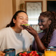 Lesbian couple sharing avocado toast at home during breakfast Lesbian couple sharing avocado toast at home during breakfast - PhotoDune Item for Sale