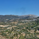 Terraced agricultural fields and countryside homes stretch across Terraced agricultural fields and countryside homes stretch across - PhotoDune Item for Sale