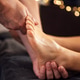 Close-up of a skilled hand performing a relaxing foot massage on a client Close-up of a skilled hand performing a relaxing foot massage on a client - PhotoDune Item for Sale
