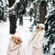 Handsome mother and daughter are having fun outdoor in winter time. Playing with snow in forest Handsome mother and daughter are having fun outdoor in winter time. Playing with snow in forest - PhotoDune Item for Sale