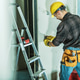 Builder Works on Wall Inside Construction Site Builder Works on Wall Inside Construction Site - PhotoDune Item for Sale
