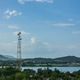 cell tower for a mobile phone over a rural, forested area in Thailand cell tower for a mobile phone over a rural, forested area in Thailand - PhotoDune Item for Sale