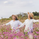 Happy Asian Senior Women Enjoying Freedom in Pink Flower Field Happy Asian Senior Women Enjoying Freedom in Pink Flower Field - PhotoDune Item for Sale