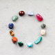 Colorful Crystal Healing Stones in Circle Formation Colorful Crystal Healing Stones in Circle Formation - PhotoDune Item for Sale