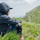 A boy of six years old, a preschooler in clothes for sports travel, sits against the backdrop of A boy of six years old, a preschooler in clothes for sports travel, sits against the backdrop of - PhotoDune Item for Sale