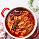 Classic borscht with chicken in a red pot. Classic borscht with chicken in a red pot. - PhotoDune Item for Sale
