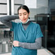 Tired female healthcare worker experiencing stress and burnout Tired female healthcare worker experiencing stress and burnout - PhotoDune Item for Sale