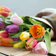 Bouquet of colorful tulips on a wooden box Bouquet of colorful tulips on a wooden box - PhotoDune Item for Sale
