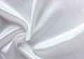 White satin fabric as background. Closeup of rippled white silk fabric with copy space. White satin fabric as background. Closeup of rippled white silk fabric with copy space. - PhotoDune Item for Sale