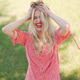 Joyful Woman Enjoying Sunny Day in Flowery Dress Joyful Woman Enjoying Sunny Day in Flowery Dress - PhotoDune Item for Sale