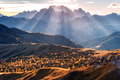 Mountain valley lighted with bright sunbeams at sunset Mountain valley lighted with bright sunbeams at sunset - PhotoDune Item for Sale