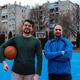 Two men stand on a basketball court in an urban area during afternoon playtime Two men stand on a basketball court in an urban area during afternoon playtime - PhotoDune Item for Sale