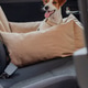 A happy dog relaxing in a car seat with cushions on a sunny day A happy dog relaxing in a car seat with cushions on a sunny day - PhotoDune Item for Sale
