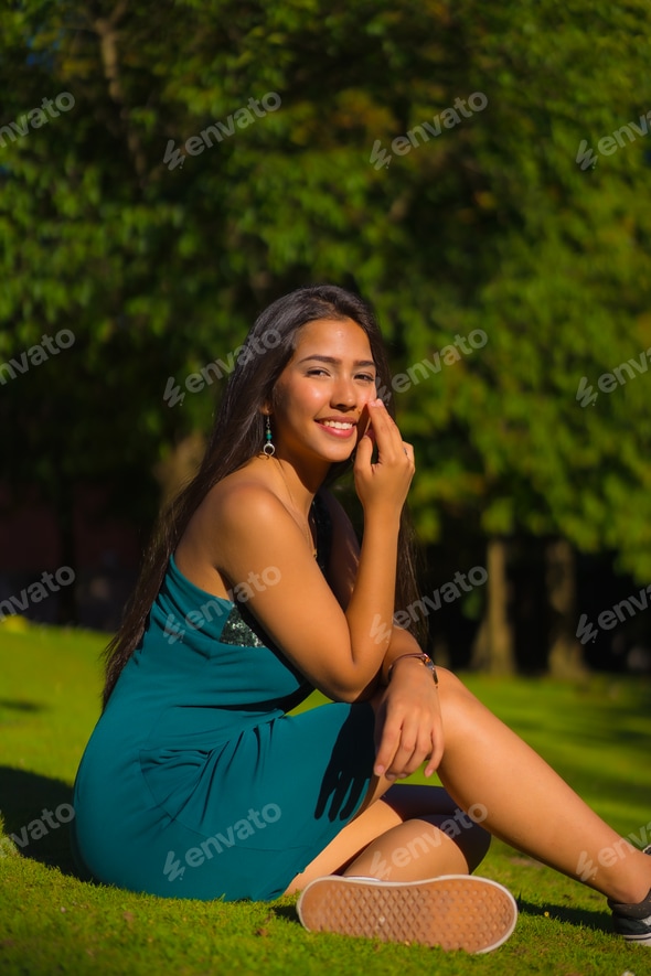 A pretty young brunette Latina with long straight hair, wearing a tight green dress. Stock Photo by Unai82 A pretty young brunette Latina with long straight hair, wearing a tight green dress. Stock Photo by Unai82