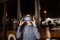 Businesswoman in the office wearing virtual reality goggles. Businesswoman in the office wearing virtual reality goggles. - PhotoDune Item for Sale