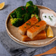 Crispy breaded fish sticks served with steamed broccoli, yogurt sauce, and a lemon wedge Crispy breaded fish sticks served with steamed broccoli, yogurt sauce, and a lemon wedge - PhotoDune Item for Sale