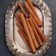 Cinnamon sticks on vintage plate Cinnamon sticks on vintage plate - PhotoDune Item for Sale