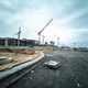Minsk, Belarus - May 2022: construction of a large shopping center in a new microdistrict. Minsk, Belarus - May 2022: construction of a large shopping center in a new microdistrict. - PhotoDune Item for Sale