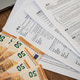 Tax forms and fifty-euro banknotes on a wooden desk. Financial management and tax preparation Tax forms and fifty-euro banknotes on a wooden desk. Financial management and tax preparation - PhotoDune Item for Sale