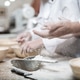 Baker preparing ceramic bowls for baking bread Baker preparing ceramic bowls for baking bread - PhotoDune Item for Sale