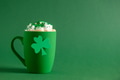 Irish coffee in green cup for St Patricks Day on green background. Irish coffee in green cup for St Patricks Day on green background. - PhotoDune Item for Sale