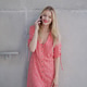 Stylish Woman in Red Dress Talking on Phone Outdoors Stylish Woman in Red Dress Talking on Phone Outdoors - PhotoDune Item for Sale