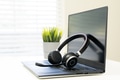 Headphone with laptop in office Headphone with laptop in office - PhotoDune Item for Sale