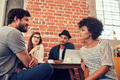 Young people meeting at a coffee shop Young people meeting at a coffee shop - PhotoDune Item for Sale