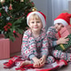 cute kids in Christmas pajamas with gift boxes at christmas morning cute kids in Christmas pajamas with gift boxes at christmas morning - PhotoDune Item for Sale
