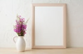 Frame mockup with purple wild flowers bouquet Frame mockup with purple wild flowers bouquet - PhotoDune Item for Sale