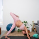 Pregnant Woman Performing Inverted Yoga Variation Indoors Pregnant Woman Performing Inverted Yoga Variation Indoors - PhotoDune Item for Sale