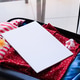 opened packed suitcase on bed in hotel room with white magazine mockup opened packed suitcase on bed in hotel room with white magazine mockup - PhotoDune Item for Sale