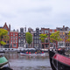 View of an Amsterdam street with canal. View of an Amsterdam street with canal. - PhotoDune Item for Sale