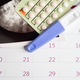 Pregnancy test and birth control pills with ultrasound scan of baby ...