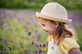 Cute smiling baby girl in beige hat outdoors in green field. Child portrait Cute smiling baby girl in beige hat outdoors in green field. Child portrait - PhotoDune Item for Sale