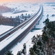 Curved S7 Metropolitan Bypass road through winter landscape in Poland Curved S7 Metropolitan Bypass road through winter landscape in Poland - PhotoDune Item for Sale