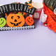 Halloween purple frame background flatlay with pumpkins and party decor Halloween purple frame background flatlay with pumpkins and party decor - PhotoDune Item for Sale