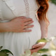 pregnant woman white dress outside belly hands pregnant woman white dress outside belly hands - PhotoDune Item for Sale