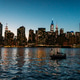 River surrounded by illuminated skyscrapers at twilight River surrounded by illuminated skyscrapers at twilight - PhotoDune Item for Sale