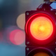 Traffic light shows red signal for cars at intersection during evening rush hour Traffic light shows red signal for cars at intersection during evening rush hour - PhotoDune Item for Sale