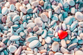 Romantic symbol of red heart on the pebble beach Romantic symbol of red heart on the pebble beach - PhotoDune Item for Sale